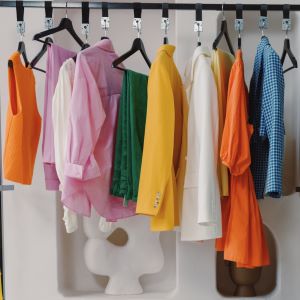 A capsule wardrobe consisting of a few colourful pieces of clothing that could be worn in different combinations with each other.
